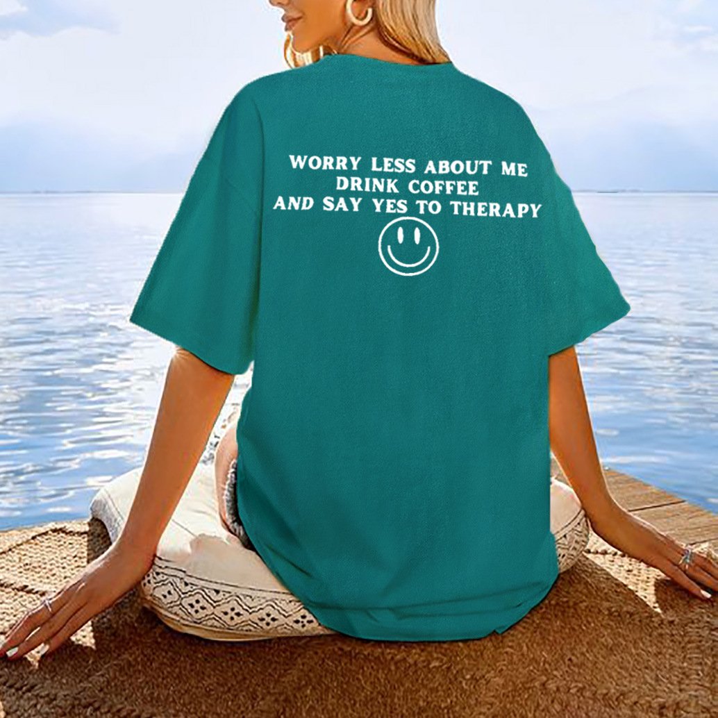 0F4F1D80-D13C-9316-25C5-5D5C5275A918.jpg Worry Less About Me Drink Coffee Smiley Women's Cotton Oversized T-Shirt - Image 1